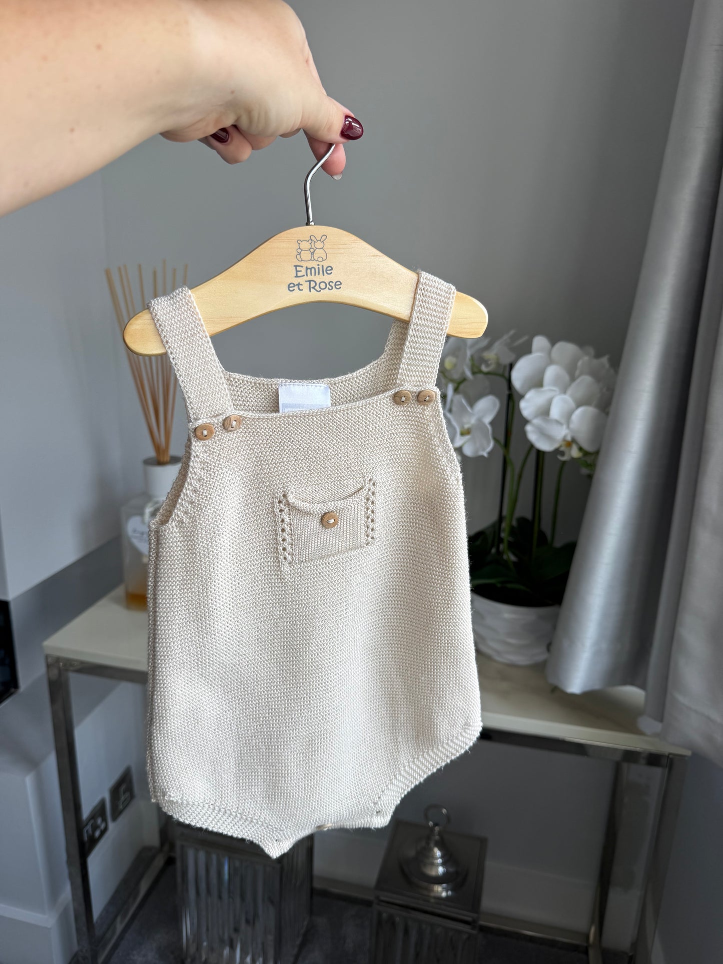 Newborn beige knit romper