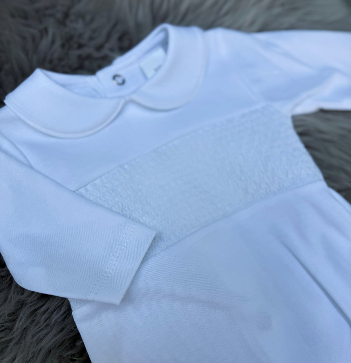 White cotton smock baby grow
