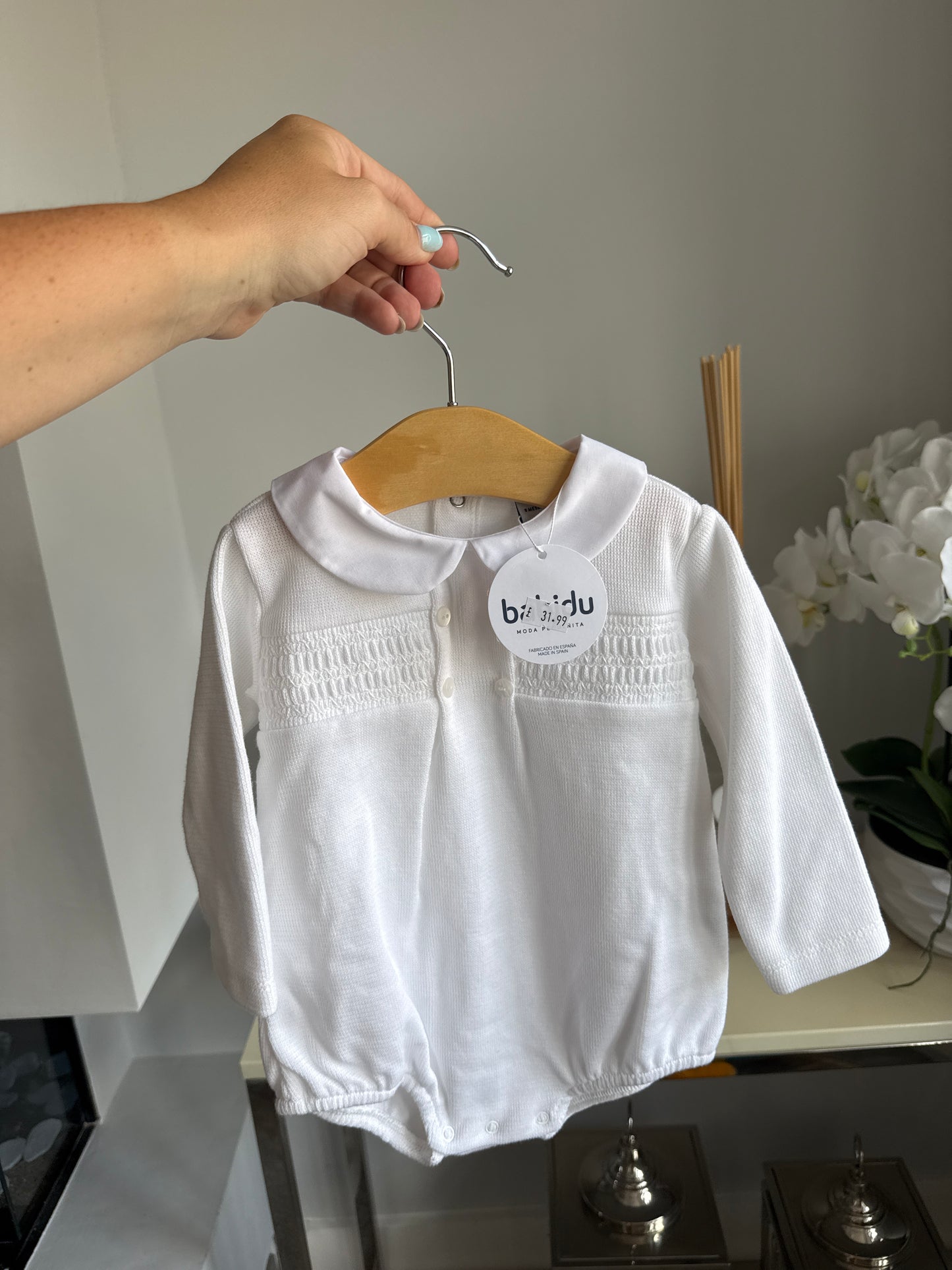 Brand new 9m white Babidu romper