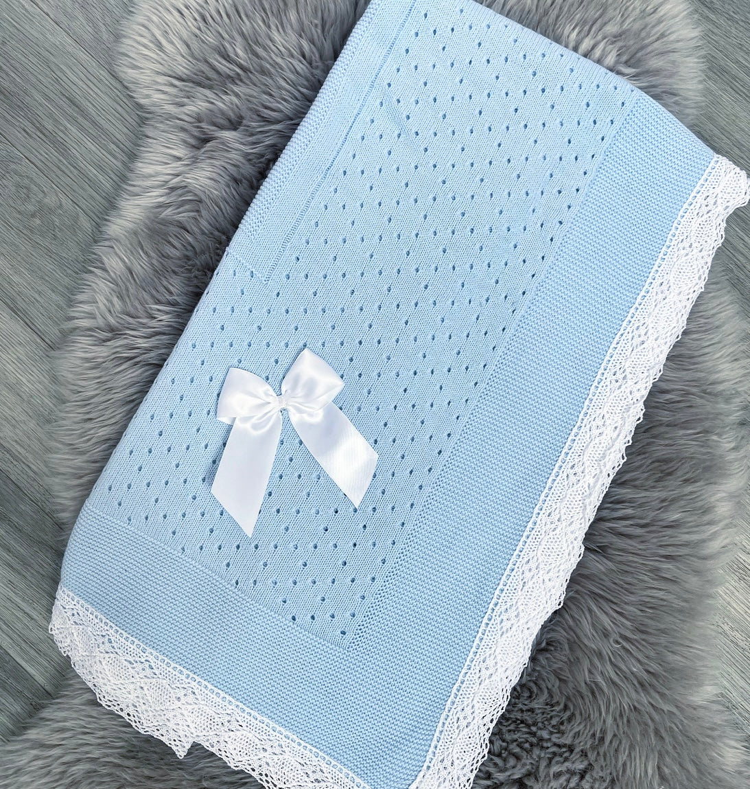 Blue Blanket With White Bow